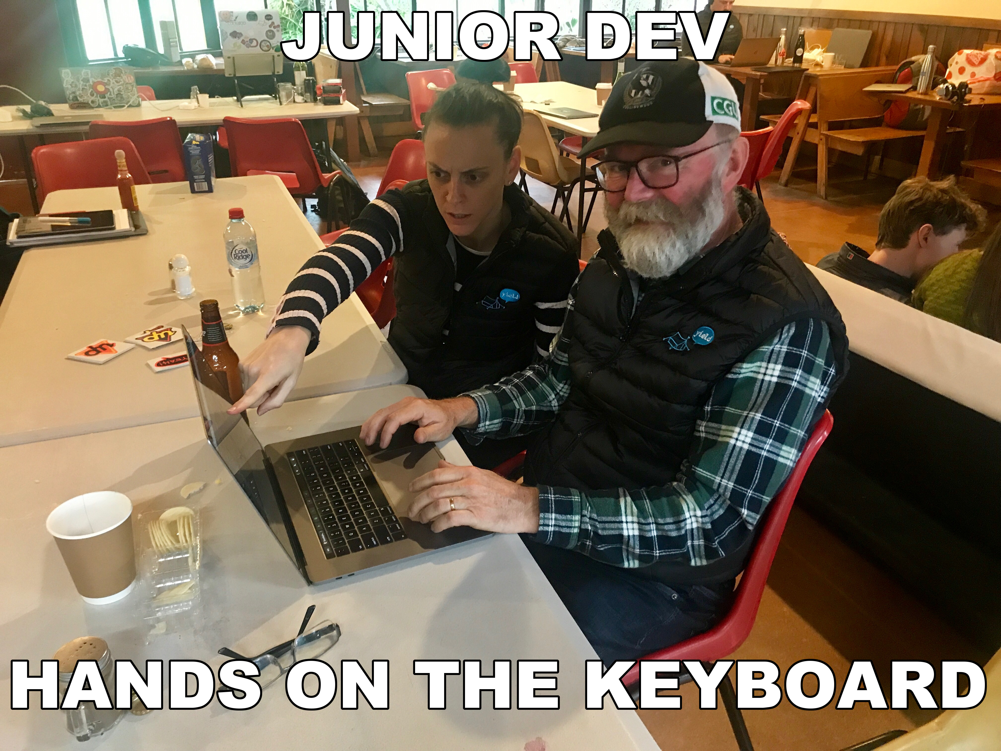 junior dev hands on the keyboard